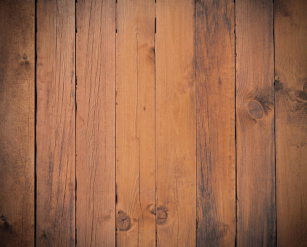 istock Dark brown wooden wall, planks.  Floor surface 525211026