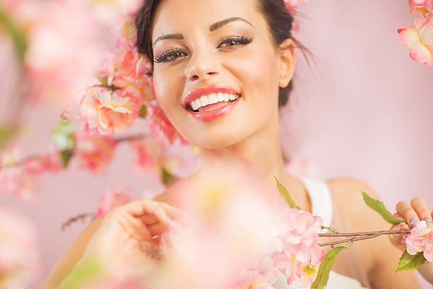 istock Pretty brunette lady among the flowers 525211331