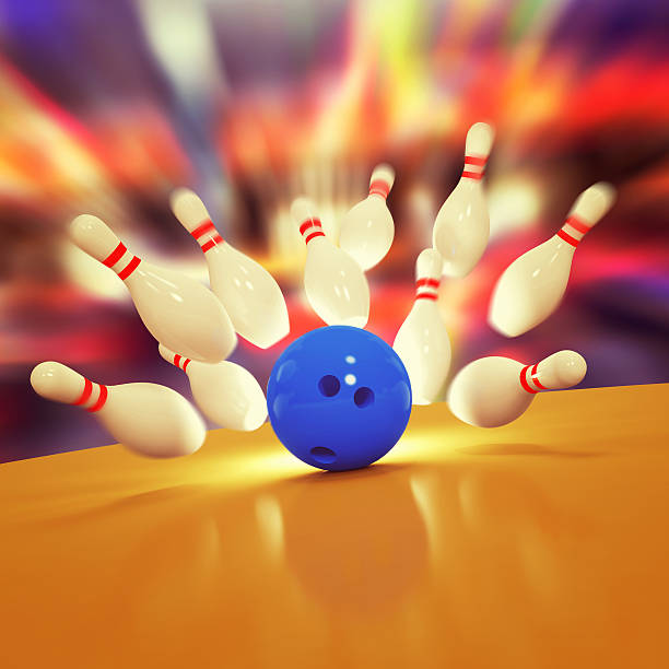 istock Scattered skittles and bowling ball 525211851