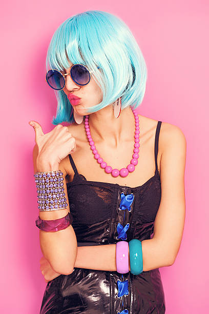 istock Cool pop girl portrait with thumbs up 525212088