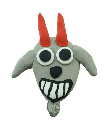 Happy goat closeup face on white background made from plasticine