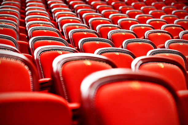 istock Rows of empty red velvet seats 525213266