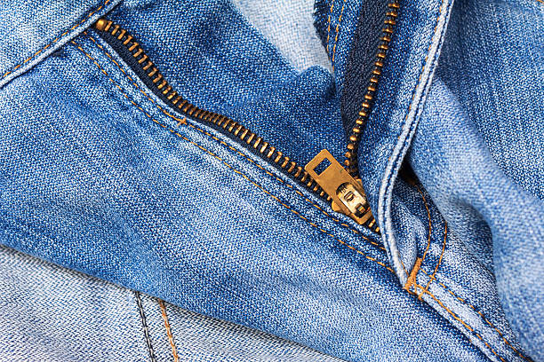 istock Closeup Blue jeans texture with zipper. 525214226