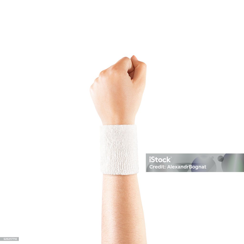 Blank white wristband mockup on hand, isolated Blank white wristband mockup on hand, isolated. Clear sweat band mock up design. Sport sweatband template wear on wrist arm. Sports support protective bandage wrap. Bangle on the tennis player hand. Sweat Band Stock Photo