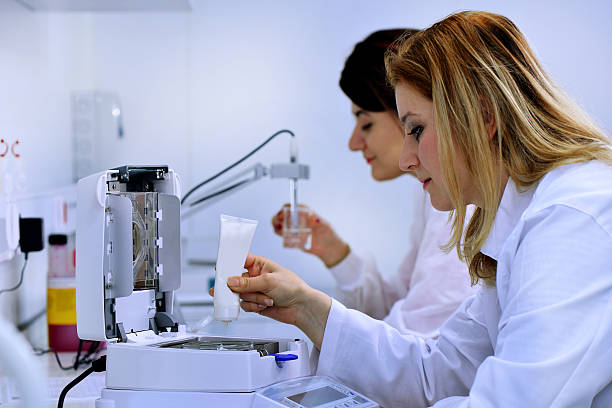 istock Two young woman in the laboratory 525217903