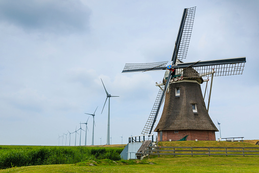 Netherlands rural lanscape with windmills at famous tourist site Kinderdijk in Holland