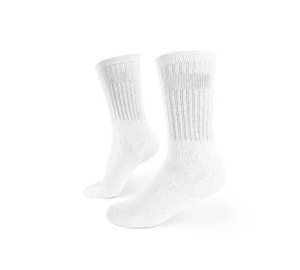 Blank white socks design mockup, isolated, clipping path. Pair sport crew cotton socks wear mock up. Long clear soft sock stand presentation. Men basketball, football, tennis plain socks template.