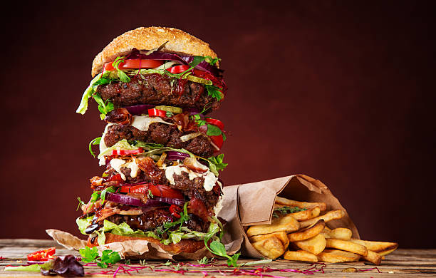 istock delicious big hamburger on wood 525220925
