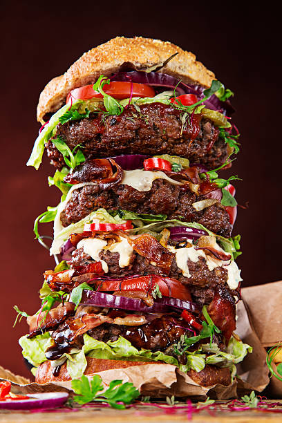 istock delicious big hamburger on wood 525220961