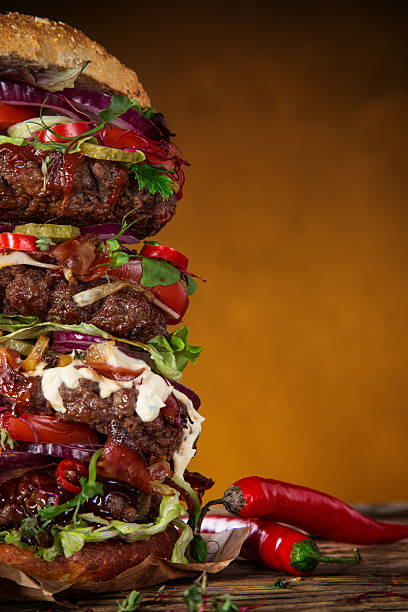 istock delicious big hamburger on wood 525220985