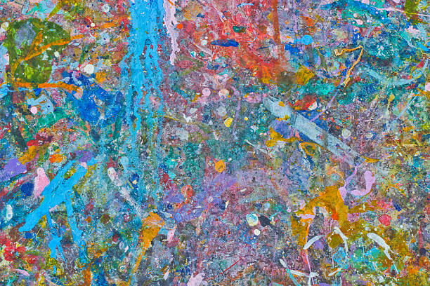 istock Abstract colorful texture background. Splash acrylic color on wood table. 525222038