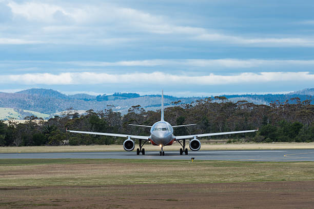 Jetstar Australia passenger airliner landing stock photo