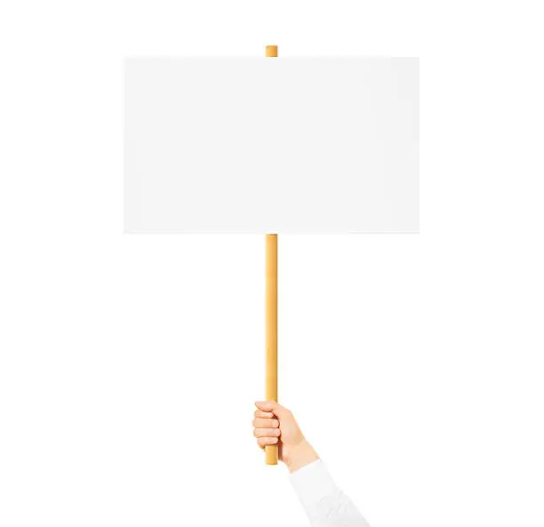 Hand holding blank banner mock up on wood stick isolated. Empty board plank hold in hands. Holding sign up. Clear signal stick. Man person holding placard signal. Protesters people on picket strike.