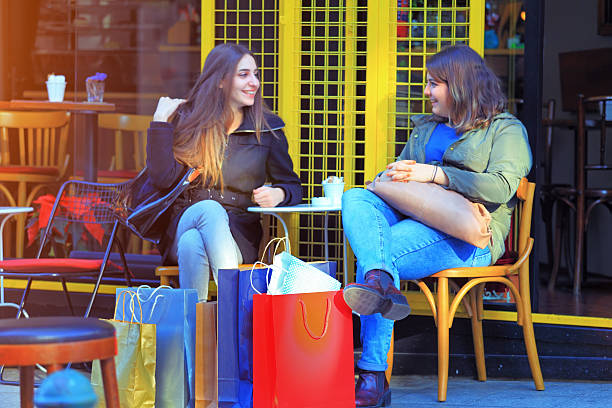 istock Two best friends sitting in a cafe and talking 525224291