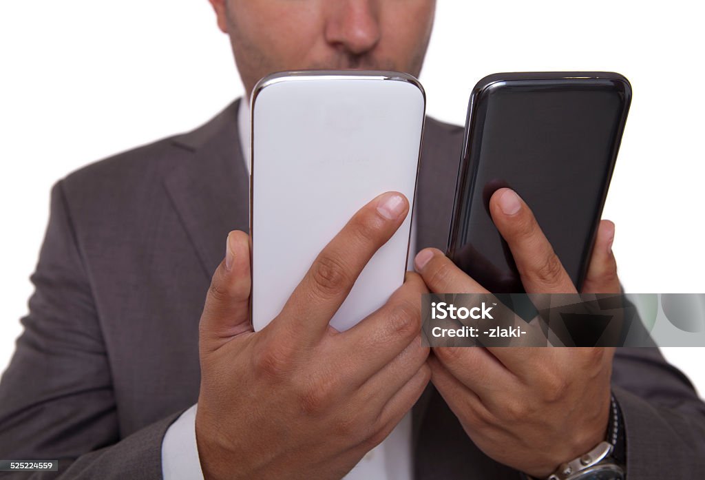 Negro o blanco teléfono móvil - Foto de stock de Dos objetos libre de derechos