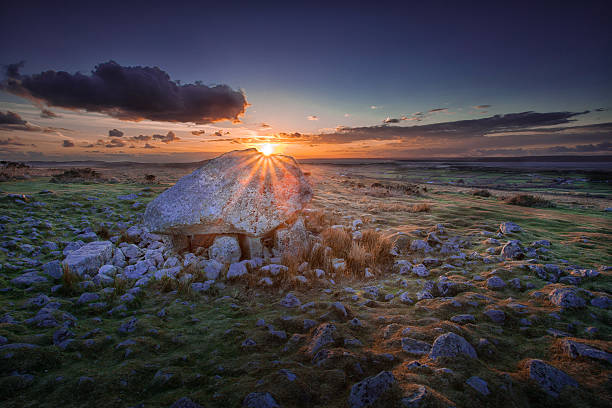 Sunset at Arthur's stone A landmark on the top of Cefn Bryn, North Gower, South Wales, Swansea. gower peninsular stock pictures, royalty-free photos & images