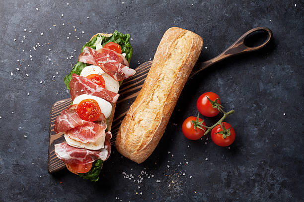 istock Ciabatta sandwich with salad, prosciutto and mozzarella 525227418