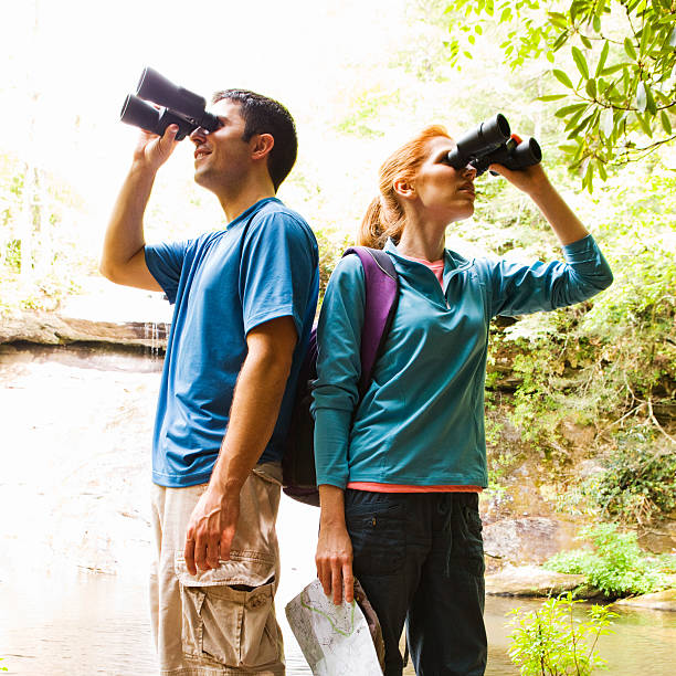 istock Couple Searching with Binocluars 525228110