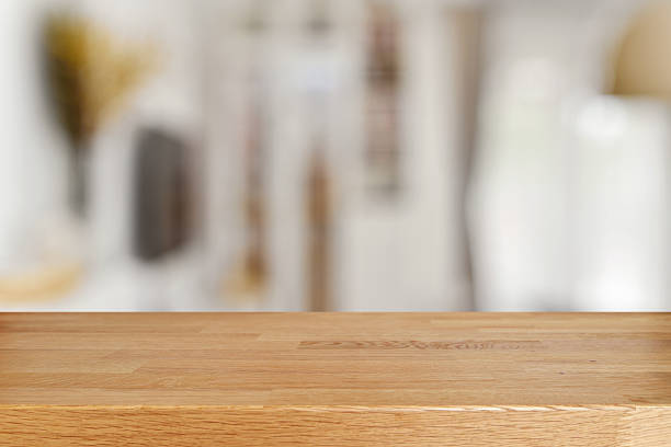 istock Wooden table and blurred living room 525229798