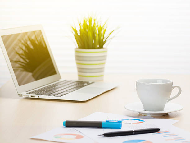 istock Office desk workplace with laptop and coffee 525231978