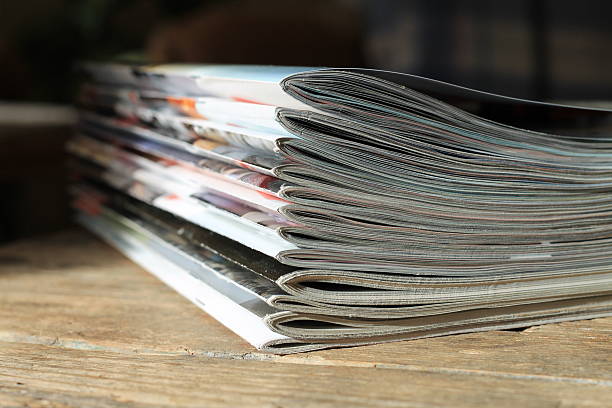 istock Magazines on the wooden table 525233518