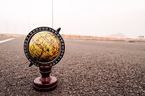 istock Globe Earth on an Asphalt Street 525234034