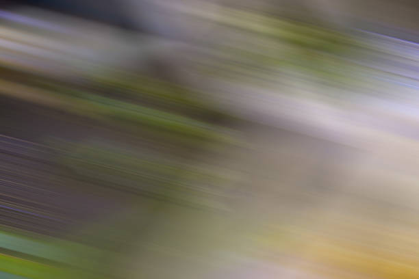 istock green,black,white and yellow color motion blur abstract 525241917