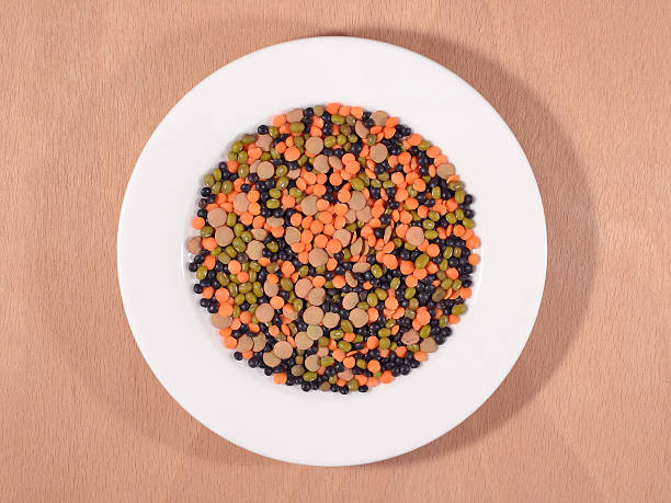 Mixture of lentils and beans on a white plate