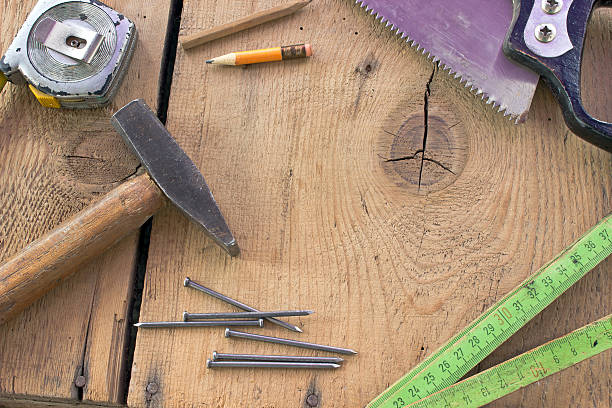 istock Old used carpentry tools on wooden background 525244929
