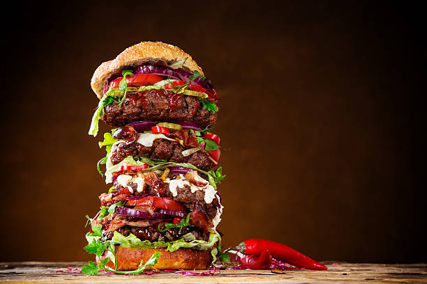 istock delicious big hamburger on wood 525245179
