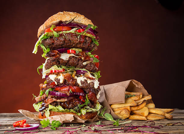 istock delicious big hamburger on wood 525245455