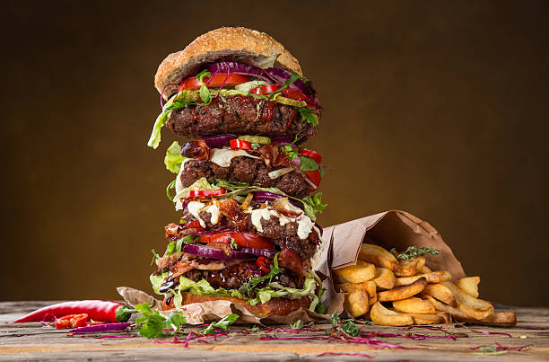istock delicious big hamburger on wood 525245463