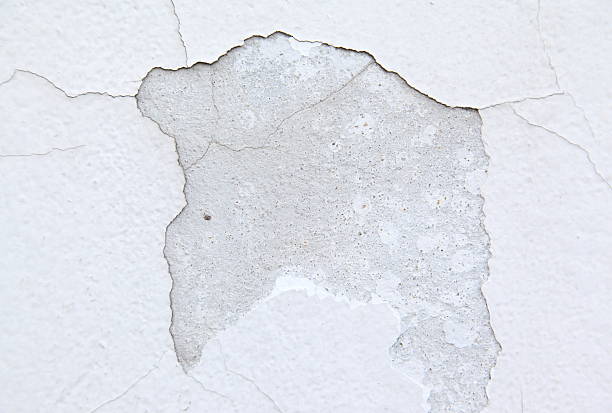istock Cracked and peeling paint and grunge old wall with texture. 525246749