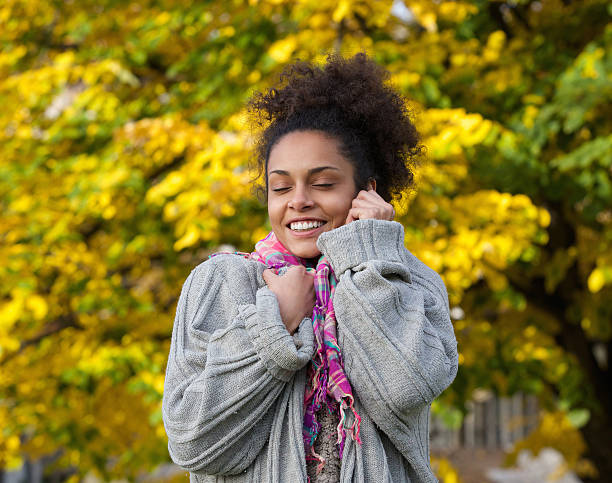 Beautiful black woman enjoying autumn