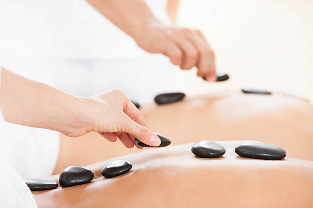 istock Therapists Giving Lastone Therapy To Couple 525258119