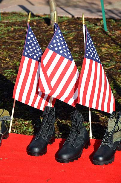 istock American Flags and Soldiers Boots 525258767
