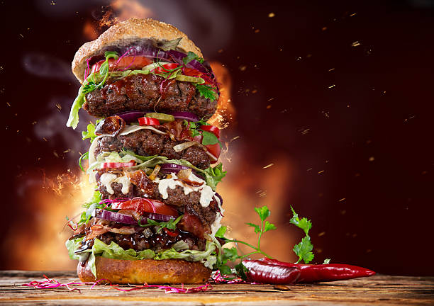 istock delicious big hamburger on wood 525259415