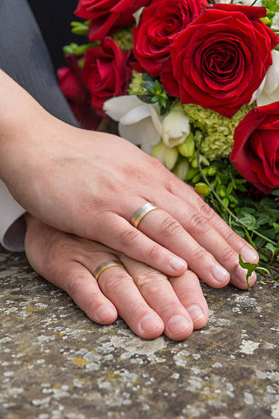 istock Hands of a newlyweds 525260057