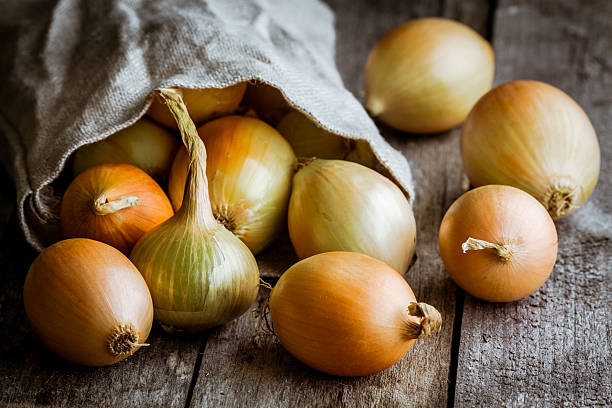 istock Fresh organic onions in a bag 525261715