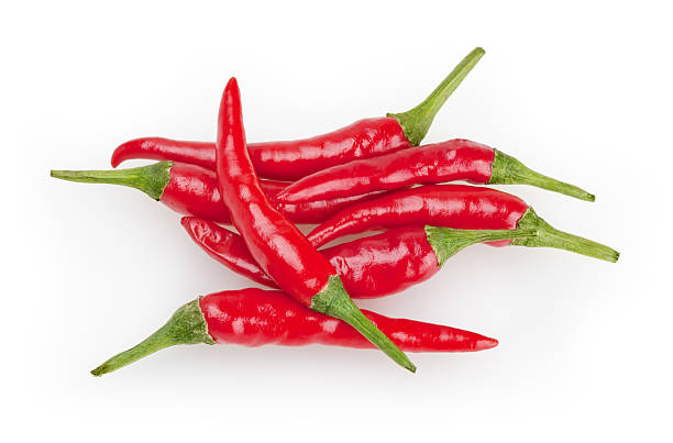 istock Red chili peppers isolated on white background 525262077