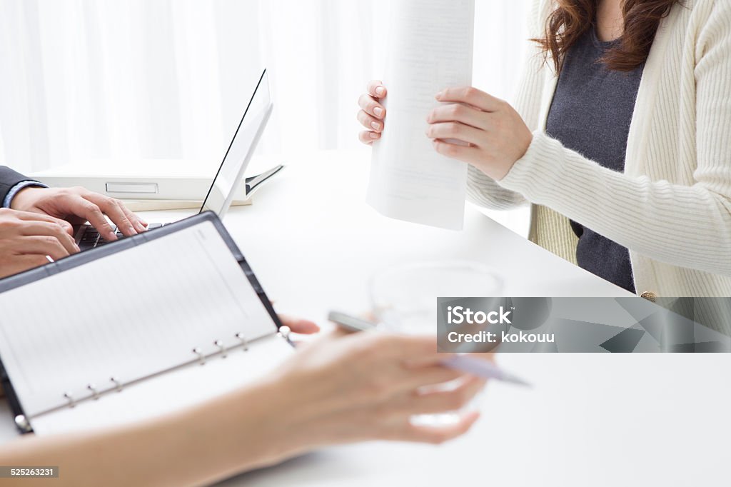 Women who are aligned documents Achievement Stock Photo