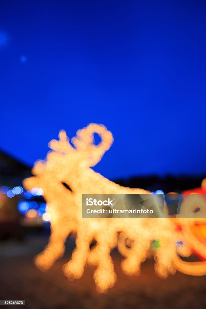 Santa's reindeer Background  - Defocused Lights Orange Multicolored Christmas bokeh backgrounds. Santa's reindeer Background - Defocused lights orange multicolored. Animal Sleigh Stock Photo