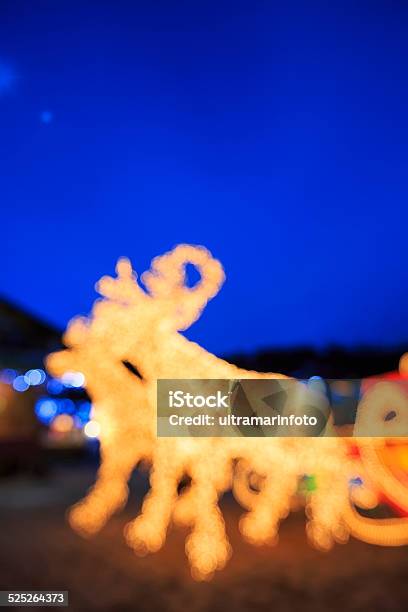 Santas Reindeer Background Defocused Lights Orange Multicolored Stock Photo - Download Image Now