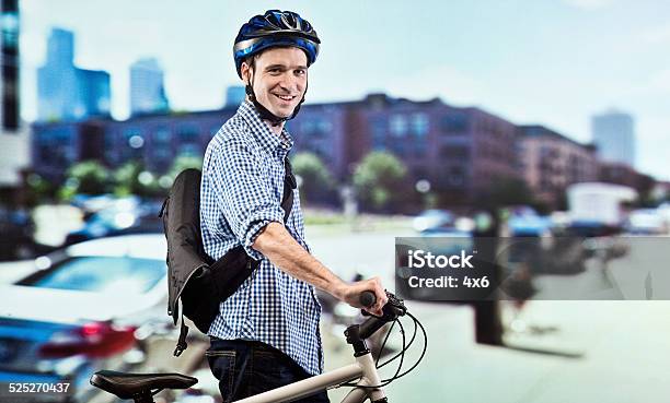 Smiling Biker Out In The City Stock Photo - Download Image Now - 30-39 Years, Adult, Adults Only
