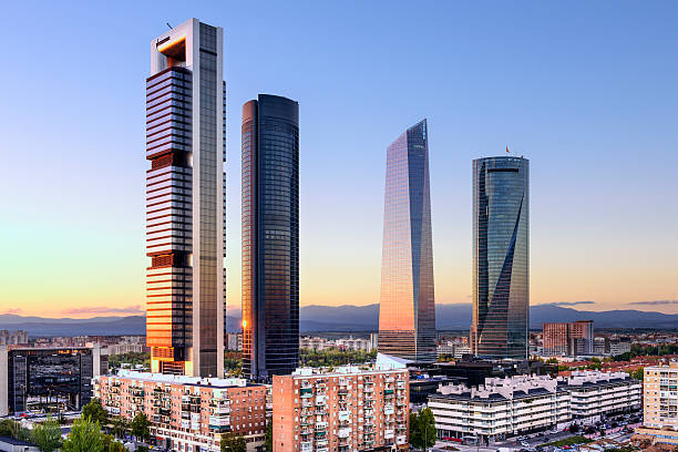 Madrid, Spain Financial District Madrid, Spain financial district skyline at dusk. madrid stock pictures, royalty-free photos & images