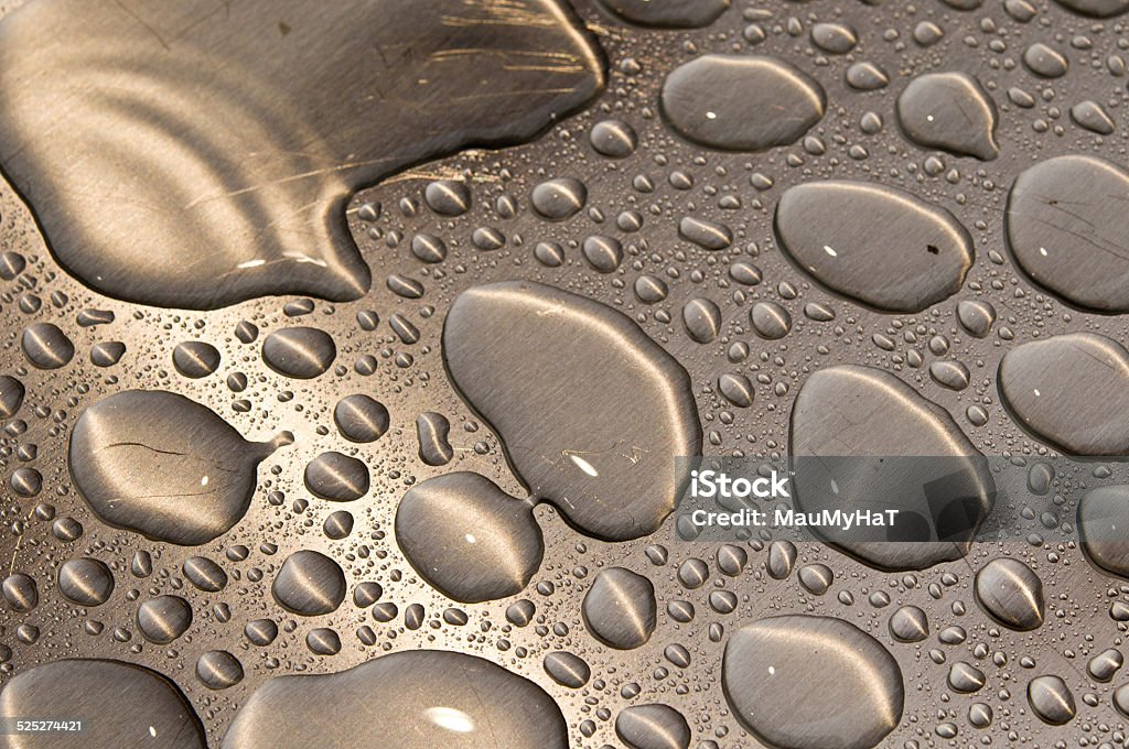 waterdrops on brushed metal Water drops on still. Abstract bacground, liquid Abstract Stock Photo