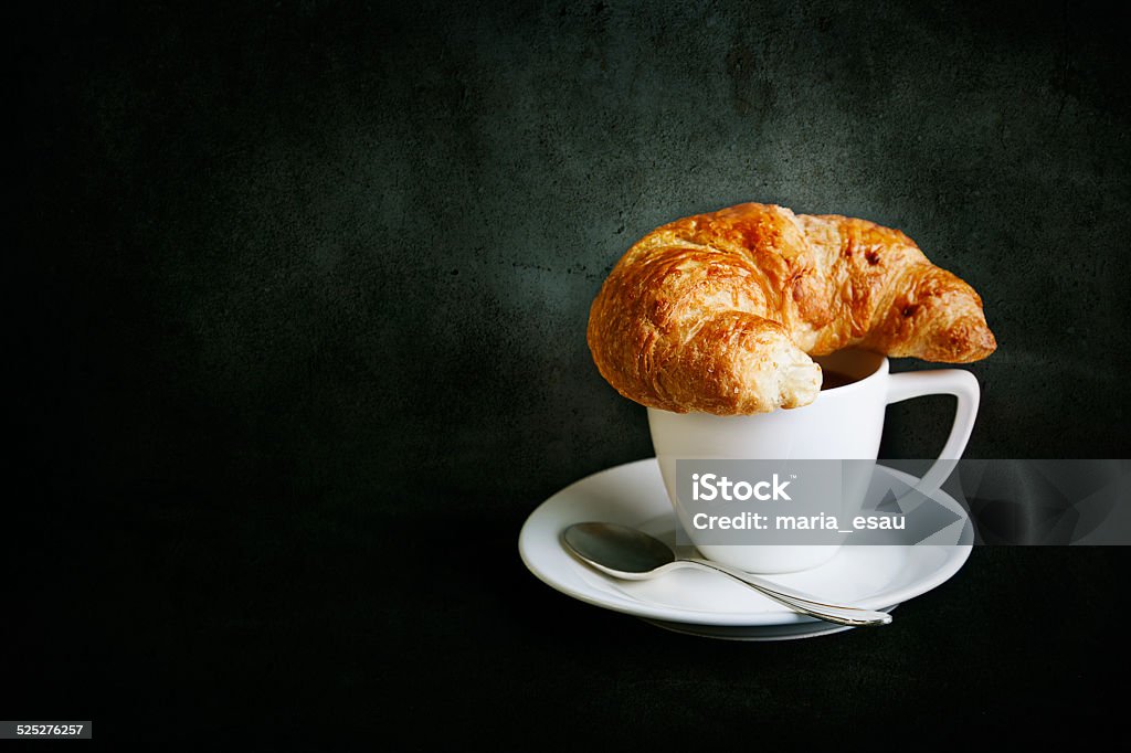 Cup of coffee with croissant Cup of coffee with croissant black copyspace Baked Pastry Item Stock Photo