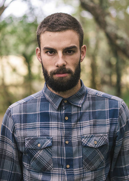 istock Hipster man portrait outdoors. 525298659