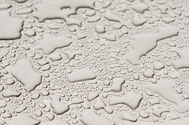 istock waterdrops on brushed metal 525299291