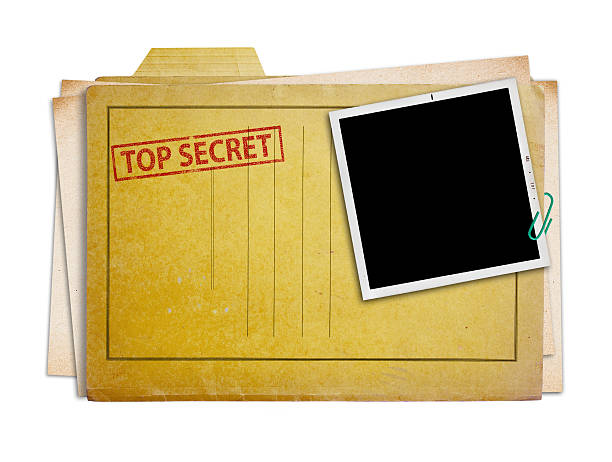 top secret folder isolated top secret folder with old photograph,  isolated, clipping path. confidential photos stock pictures, royalty-free photos & images